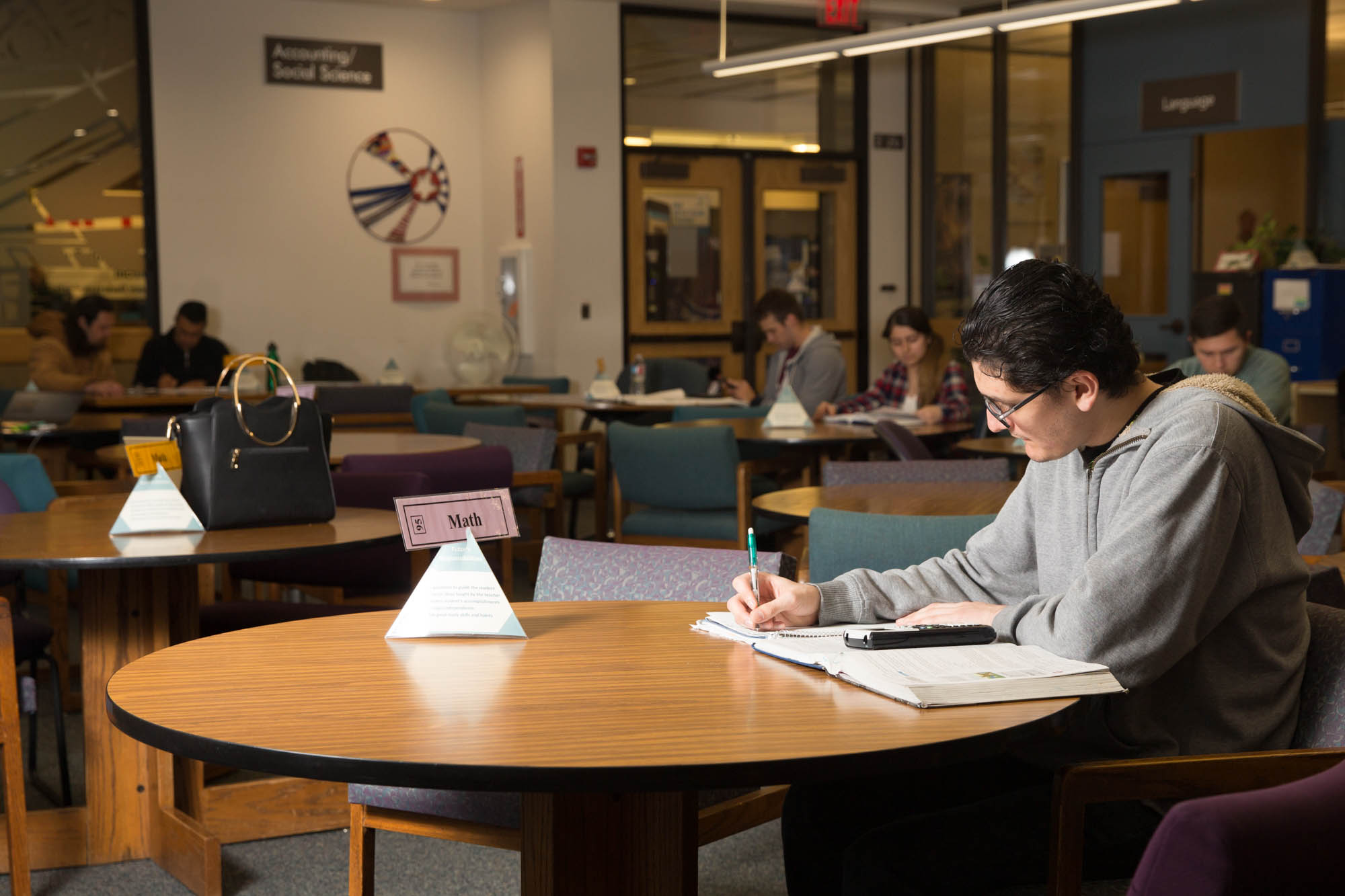 A student learning math in the tutoring center